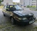 Чорний Деу Нексія, об'ємом двигуна 1.5 л та пробігом 276 тис. км за 699 $, фото 1 на Automoto.ua