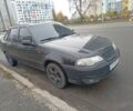 Чорний Деу Нексія, об'ємом двигуна 1.5 л та пробігом 212 тис. км за 2500 $, фото 1 на Automoto.ua