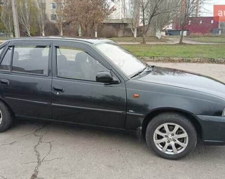 Черный Дэу Нексия, объемом двигателя 1.5 л и пробегом 66 тыс. км за 3500 $, фото 1 на Automoto.ua