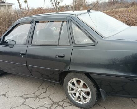 Черный Дэу Нексия, объемом двигателя 1 л и пробегом 66 тыс. км за 3500 $, фото 2 на Automoto.ua