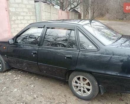 Черный Дэу Нексия, объемом двигателя 1.5 л и пробегом 66 тыс. км за 3500 $, фото 4 на Automoto.ua