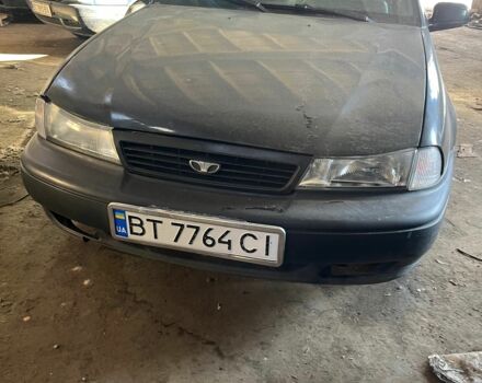 Черный Дэу Нексия, объемом двигателя 1.5 л и пробегом 255 тыс. км за 1500 $, фото 1 на Automoto.ua