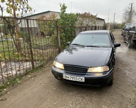 Черный Дэу Нексия, объемом двигателя 1.5 л и пробегом 150 тыс. км за 1000 $, фото 1 на Automoto.ua