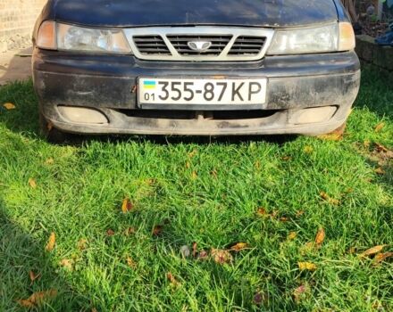 Чорний Деу Нексія, об'ємом двигуна 1.6 л та пробігом 304 тис. км за 713 $, фото 1 на Automoto.ua