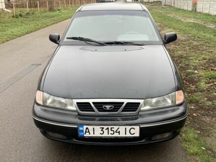 Чорний Деу Нексія, об'ємом двигуна 1.5 л та пробігом 200 тис. км за 999 $, фото 1 на Automoto.ua