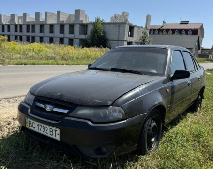 Черный Дэу Нексия, объемом двигателя 1.5 л и пробегом 240 тыс. км за 950 $, фото 1 на Automoto.ua