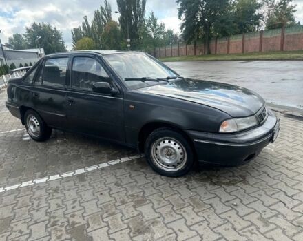 Черный Дэу Нексия, объемом двигателя 1.5 л и пробегом 213 тыс. км за 850 $, фото 1 на Automoto.ua