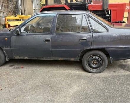 Черный Дэу Нексия, объемом двигателя 1.5 л и пробегом 200 тыс. км за 1650 $, фото 1 на Automoto.ua