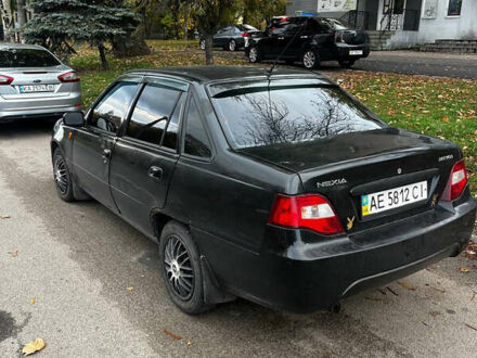 Черный Дэу Нексия, объемом двигателя 1.5 л и пробегом 250 тыс. км за 1450 $, фото 1 на Automoto.ua