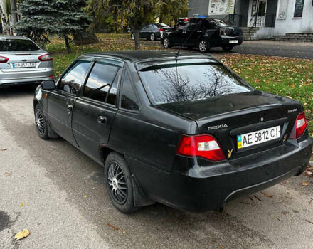 Черный Дэу Нексия, объемом двигателя 1.5 л и пробегом 250 тыс. км за 1450 $, фото 1 на Automoto.ua