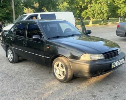 Чорний Деу Нексія, об'ємом двигуна 1.6 л та пробігом 172 тис. км за 1600 $, фото 1 на Automoto.ua