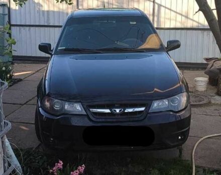 Чорний Деу Нексія, об'ємом двигуна 0 л та пробігом 125 тис. км за 2000 $, фото 1 на Automoto.ua