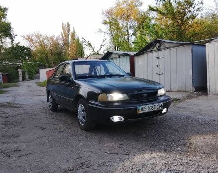 Черный Дэу Нексия, объемом двигателя 1.5 л и пробегом 235 тыс. км за 850 $, фото 1 на Automoto.ua