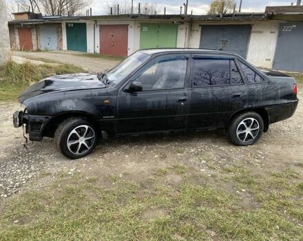 Чорний Деу Нексія, об'ємом двигуна 1.5 л та пробігом 90 тис. км за 800 $, фото 1 на Automoto.ua