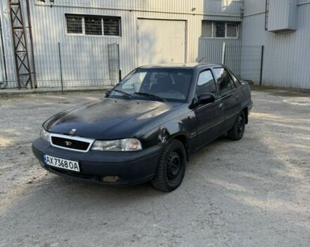 Чорний Деу Нексія, об'ємом двигуна 1.5 л та пробігом 200 тис. км за 1150 $, фото 1 на Automoto.ua