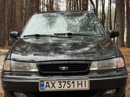 Черный Дэу Нексия, объемом двигателя 1.5 л и пробегом 570 тыс. км за 950 $, фото 1 на Automoto.ua