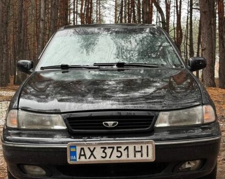 Черный Дэу Нексия, объемом двигателя 1.5 л и пробегом 570 тыс. км за 950 $, фото 1 на Automoto.ua