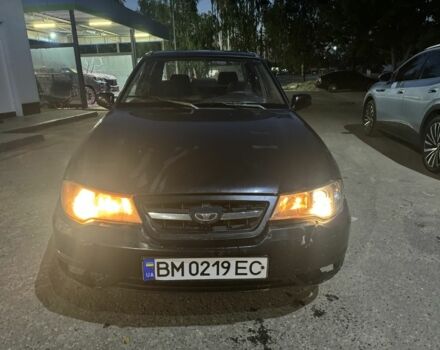 Черный Дэу Нексия, объемом двигателя 1.5 л и пробегом 240 тыс. км за 950 $, фото 1 на Automoto.ua