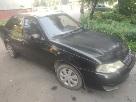 Чорний Деу Нексія, об'ємом двигуна 1.6 л та пробігом 237 тис. км за 1500 $, фото 1 на Automoto.ua