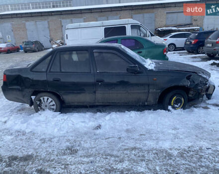 Черный Дэу Нексия, объемом двигателя 1.6 л и пробегом 244 тыс. км за 1200 $, фото 1 на Automoto.ua