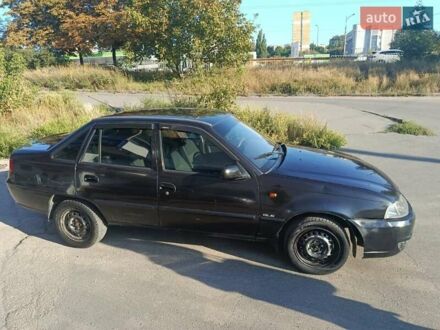 Черный Дэу Нексия, объемом двигателя 1.6 л и пробегом 122 тыс. км за 2400 $, фото 1 на Automoto.ua