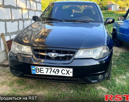 Чорний Деу Нексія, об'ємом двигуна 1.5 л та пробігом 184 тис. км за 1000 $, фото 1 на Automoto.ua
