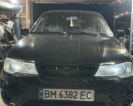 Черный Дэу Нексия, объемом двигателя 1.6 л и пробегом 235 тыс. км за 1700 $, фото 1 на Automoto.ua