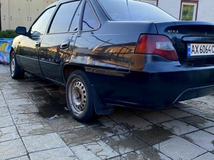 Деу Нексія 2011 у Змиеве на Automoto.ua Чорний Деу Нексія, об'ємом двигуна 1.5 л та пробігом 400 тис. км за 870 $, фото 1 на Automoto.ua