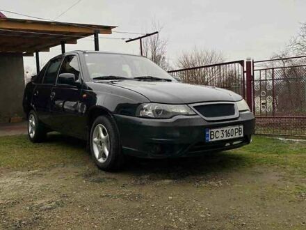 Черный Дэу Нексия, объемом двигателя 1.5 л и пробегом 252 тыс. км за 2300 $, фото 1 на Automoto.ua