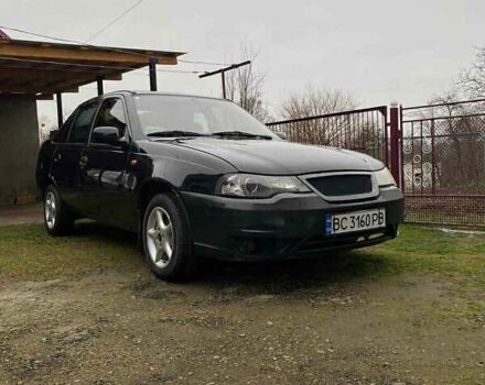 Черный Дэу Нексия, объемом двигателя 1.5 л и пробегом 252 тыс. км за 2300 $, фото 1 на Automoto.ua