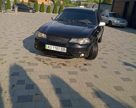 Черный Дэу Нексия, объемом двигателя 1.6 л и пробегом 280 тыс. км за 1200 $, фото 1 на Automoto.ua