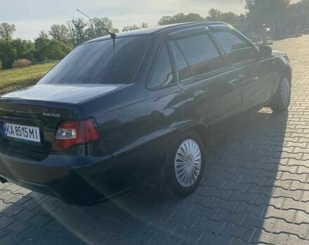 Чорний Деу Нексія, об'ємом двигуна 1.6 л та пробігом 220 тис. км за 2195 $, фото 1 на Automoto.ua