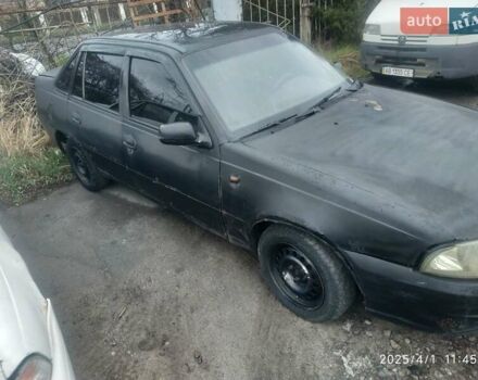 Чорний Деу Нексія, об'ємом двигуна 1.6 л та пробігом 236 тис. км за 850 $, фото 1 на Automoto.ua
