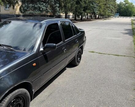 Чорний Деу Нексія, об'ємом двигуна 1.6 л та пробігом 202 тис. км за 2150 $, фото 1 на Automoto.ua