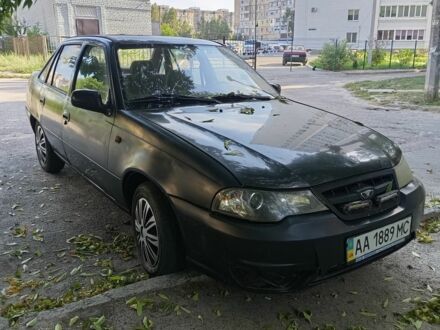 Чорний Деу Нексія, об'ємом двигуна 1.5 л та пробігом 276 тис. км за 700 $, фото 1 на Automoto.ua