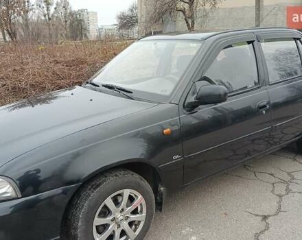 Черный Дэу Нексия, объемом двигателя 1.5 л и пробегом 66 тыс. км за 3500 $, фото 1 на Automoto.ua