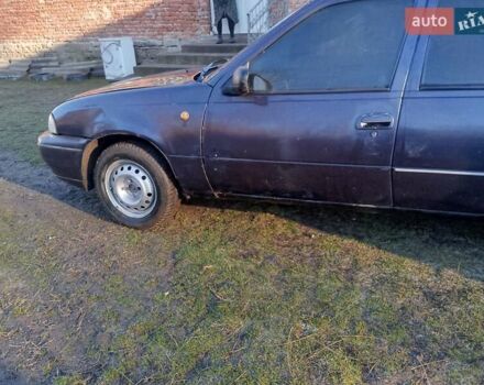 Фиолетовый Дэу Нексия, объемом двигателя 1.5 л и пробегом 140 тыс. км за 700 $, фото 1 на Automoto.ua