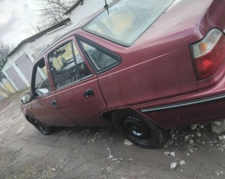 Червоний Деу Нексія, об'ємом двигуна 1.3 л та пробігом 250 тис. км за 832 $, фото 1 на Automoto.ua