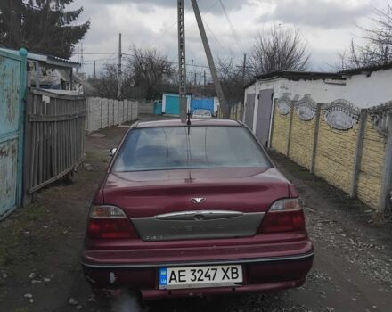 Червоний Деу Нексія, об'ємом двигуна 1.3 л та пробігом 250 тис. км за 832 $, фото 3 на Automoto.ua