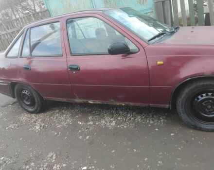 Червоний Деу Нексія, об'ємом двигуна 1.3 л та пробігом 250 тис. км за 832 $, фото 2 на Automoto.ua