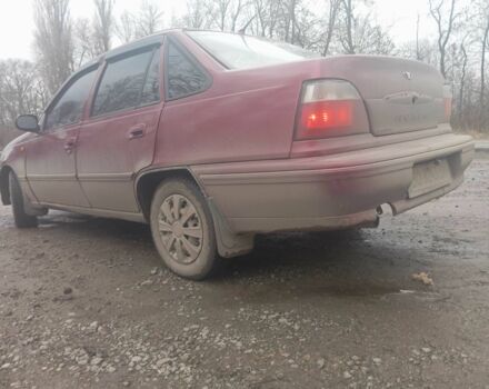 Червоний Деу Нексія, об'ємом двигуна 1.5 л та пробігом 233 тис. км за 1750 $, фото 1 на Automoto.ua