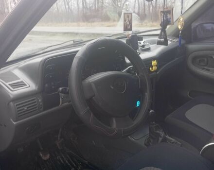 Червоний Деу Нексія, об'ємом двигуна 1.5 л та пробігом 233 тис. км за 1750 $, фото 5 на Automoto.ua