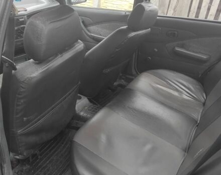 Червоний Деу Нексія, об'ємом двигуна 1.3 л та пробігом 250 тис. км за 832 $, фото 4 на Automoto.ua