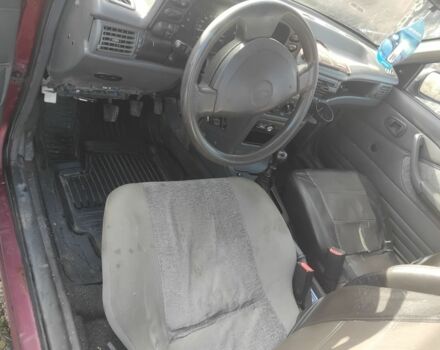 Червоний Деу Нексія, об'ємом двигуна 1.3 л та пробігом 250 тис. км за 832 $, фото 5 на Automoto.ua