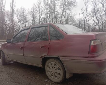 Червоний Деу Нексія, об'ємом двигуна 1.5 л та пробігом 233 тис. км за 1750 $, фото 9 на Automoto.ua