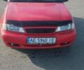 Червоний Деу Нексія, об'ємом двигуна 1.5 л та пробігом 300 тис. км за 1400 $, фото 1 на Automoto.ua