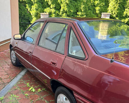 Червоний Деу Нексія, об'ємом двигуна 1.5 л та пробігом 102 тис. км за 1399 $, фото 2 на Automoto.ua