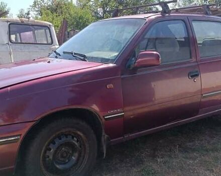 Деу Нексія 2005 у Бородянке на Automoto.ua Червоний Деу Нексія, об'ємом двигуна 1.5 л та пробігом 332 тис. км за 1500 $, фото 5 на Automoto.ua