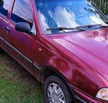 Червоний Деу Нексія, об'ємом двигуна 1.5 л та пробігом 230 тис. км за 1550 $, фото 6 на Automoto.ua