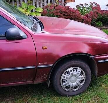 Червоний Деу Нексія, об'ємом двигуна 1.5 л та пробігом 230 тис. км за 1350 $, фото 7 на Automoto.ua